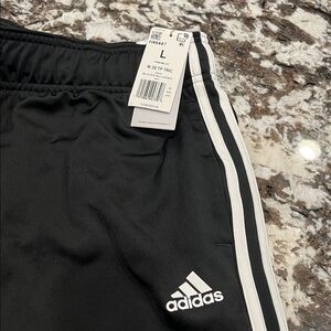 Women’s adidas track pants. New with tags.